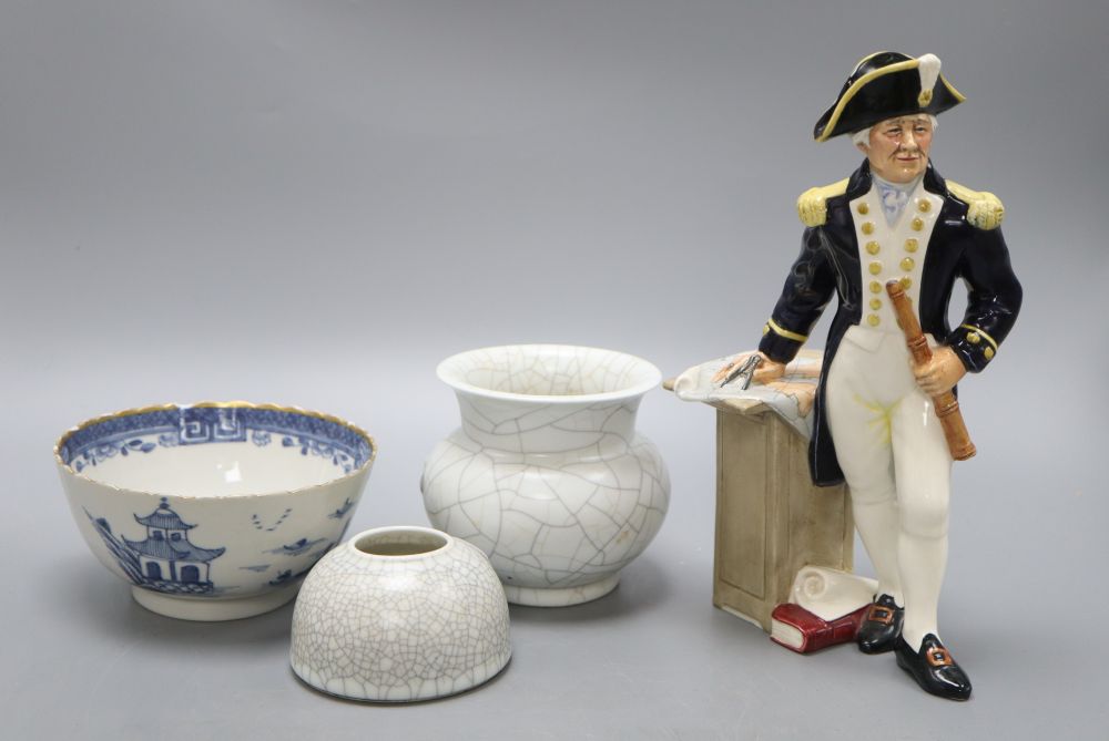 A Doulton figure, The Captain and a Chinese blue and white bowl